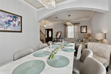 This 4 bedroom and 2.5 bath home has a great pond view, and is on Heritage Isles Golf and Country Club in Florida - for sale on GolfHomes.com, golf home, golf lot
