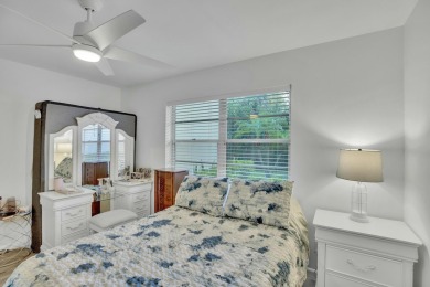 Remarkably renovated 1st floor corner unit located in Vista on Vero Beach South Golf Course in Florida - for sale on GolfHomes.com, golf home, golf lot