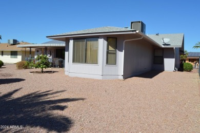 Impressive curb appeal in Sun City West, a vibrant 55+ active on Stardust Golf Course in Arizona - for sale on GolfHomes.com, golf home, golf lot