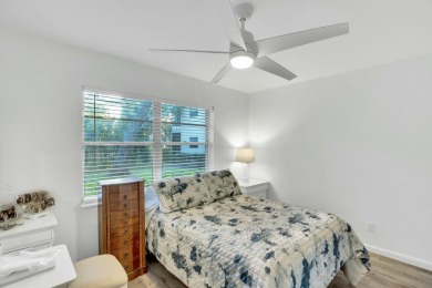 Remarkably renovated 1st floor corner unit located in Vista on Vero Beach South Golf Course in Florida - for sale on GolfHomes.com, golf home, golf lot