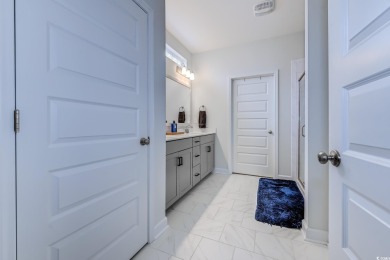 Better Than New! This lovely craftsman-style home features three on International Club of Myrtle Beach in South Carolina - for sale on GolfHomes.com, golf home, golf lot