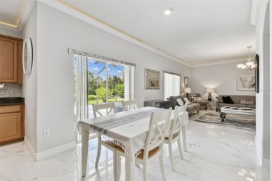 This 4 bedroom and 2.5 bath home has a great pond view, and is on Heritage Isles Golf and Country Club in Florida - for sale on GolfHomes.com, golf home, golf lot