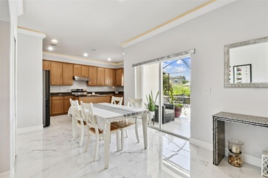 This 4 bedroom and 2.5 bath home has a great pond view, and is on Heritage Isles Golf and Country Club in Florida - for sale on GolfHomes.com, golf home, golf lot