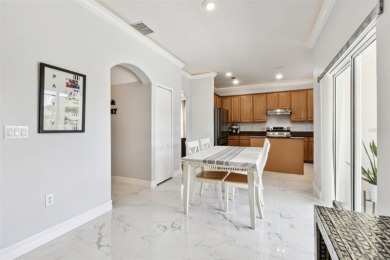 This 4 bedroom and 2.5 bath home has a great pond view, and is on Heritage Isles Golf and Country Club in Florida - for sale on GolfHomes.com, golf home, golf lot