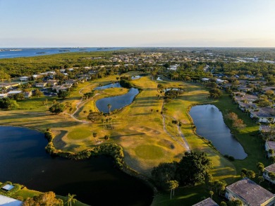Remarkably renovated 1st floor corner unit located in Vista on Vero Beach South Golf Course in Florida - for sale on GolfHomes.com, golf home, golf lot