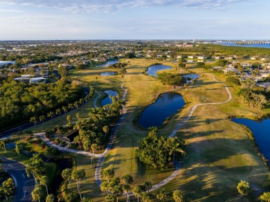 Remarkably renovated 1st floor corner unit located in Vista on Vero Beach South Golf Course in Florida - for sale on GolfHomes.com, golf home, golf lot
