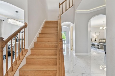 This 4 bedroom and 2.5 bath home has a great pond view, and is on Heritage Isles Golf and Country Club in Florida - for sale on GolfHomes.com, golf home, golf lot