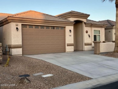 Least expensive 3 bd/2 ba home with a 2 car garage on the island on Havasu Island Golf Course in Arizona - for sale on GolfHomes.com, golf home, golf lot