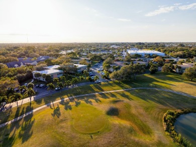 Remarkably renovated 1st floor corner unit located in Vista on Vero Beach South Golf Course in Florida - for sale on GolfHomes.com, golf home, golf lot