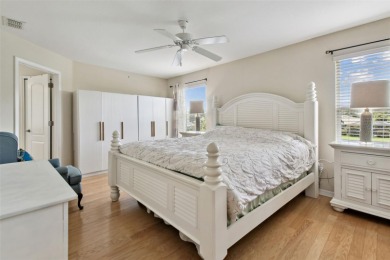 This 4 bedroom and 2.5 bath home has a great pond view, and is on Heritage Isles Golf and Country Club in Florida - for sale on GolfHomes.com, golf home, golf lot