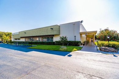 Remarkably renovated 1st floor corner unit located in Vista on Vero Beach South Golf Course in Florida - for sale on GolfHomes.com, golf home, golf lot
