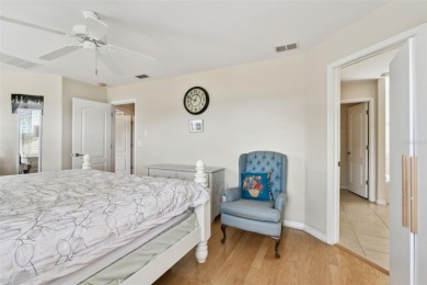 This 4 bedroom and 2.5 bath home has a great pond view, and is on Heritage Isles Golf and Country Club in Florida - for sale on GolfHomes.com, golf home, golf lot