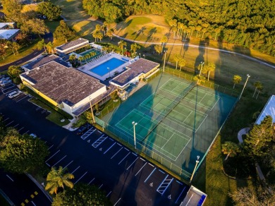 Remarkably renovated 1st floor corner unit located in Vista on Vero Beach South Golf Course in Florida - for sale on GolfHomes.com, golf home, golf lot