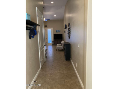 Least expensive 3 bd/2 ba home with a 2 car garage on the island on Havasu Island Golf Course in Arizona - for sale on GolfHomes.com, golf home, golf lot