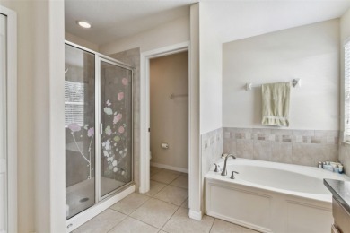 This 4 bedroom and 2.5 bath home has a great pond view, and is on Heritage Isles Golf and Country Club in Florida - for sale on GolfHomes.com, golf home, golf lot