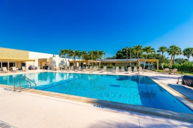 Remarkably renovated 1st floor corner unit located in Vista on Vero Beach South Golf Course in Florida - for sale on GolfHomes.com, golf home, golf lot