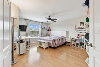This 4 bedroom and 2.5 bath home has a great pond view, and is on Heritage Isles Golf and Country Club in Florida - for sale on GolfHomes.com, golf home, golf lot
