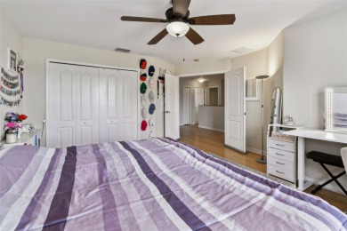 This 4 bedroom and 2.5 bath home has a great pond view, and is on Heritage Isles Golf and Country Club in Florida - for sale on GolfHomes.com, golf home, golf lot