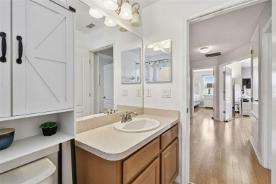 This 4 bedroom and 2.5 bath home has a great pond view, and is on Heritage Isles Golf and Country Club in Florida - for sale on GolfHomes.com, golf home, golf lot
