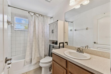 This 4 bedroom and 2.5 bath home has a great pond view, and is on Heritage Isles Golf and Country Club in Florida - for sale on GolfHomes.com, golf home, golf lot