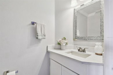 This 4 bedroom and 2.5 bath home has a great pond view, and is on Heritage Isles Golf and Country Club in Florida - for sale on GolfHomes.com, golf home, golf lot