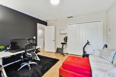 This 4 bedroom and 2.5 bath home has a great pond view, and is on Heritage Isles Golf and Country Club in Florida - for sale on GolfHomes.com, golf home, golf lot