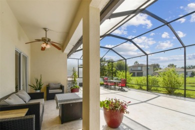 This 4 bedroom and 2.5 bath home has a great pond view, and is on Heritage Isles Golf and Country Club in Florida - for sale on GolfHomes.com, golf home, golf lot