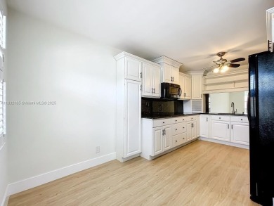 This unit is a RENOVATED & UPDATED -1370 SF 2BR/2BA unit in the on Sunrise Lakes Phase IV Golf Course in Florida - for sale on GolfHomes.com, golf home, golf lot