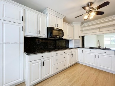 This unit is a RENOVATED & UPDATED -1370 SF 2BR/2BA unit in the on Sunrise Lakes Phase IV Golf Course in Florida - for sale on GolfHomes.com, golf home, golf lot