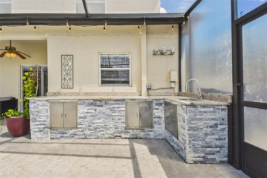 This 4 bedroom and 2.5 bath home has a great pond view, and is on Heritage Isles Golf and Country Club in Florida - for sale on GolfHomes.com, golf home, golf lot