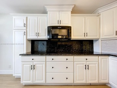 This unit is a RENOVATED & UPDATED -1370 SF 2BR/2BA unit in the on Sunrise Lakes Phase IV Golf Course in Florida - for sale on GolfHomes.com, golf home, golf lot