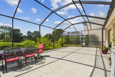 This 4 bedroom and 2.5 bath home has a great pond view, and is on Heritage Isles Golf and Country Club in Florida - for sale on GolfHomes.com, golf home, golf lot