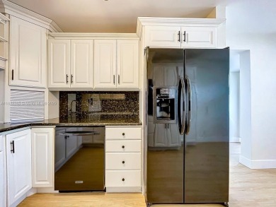 This unit is a RENOVATED & UPDATED -1370 SF 2BR/2BA unit in the on Sunrise Lakes Phase IV Golf Course in Florida - for sale on GolfHomes.com, golf home, golf lot