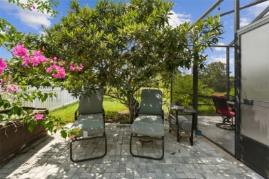 This 4 bedroom and 2.5 bath home has a great pond view, and is on Heritage Isles Golf and Country Club in Florida - for sale on GolfHomes.com, golf home, golf lot