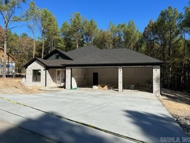 Welcome to this beautiful new construction, fully brick home in on Granada Golf Course in Arkansas - for sale on GolfHomes.com, golf home, golf lot