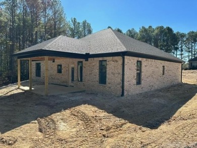 Welcome to this beautiful new construction, fully brick home in on Granada Golf Course in Arkansas - for sale on GolfHomes.com, golf home, golf lot