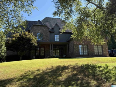This custom home welcomes you with double front doors, an on Greystone Golf and Country Club-Founders Course in Alabama - for sale on GolfHomes.com, golf home, golf lot