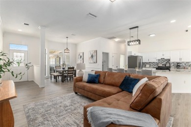 Step inside this beautifully updated 4-bedroom, 2.5-bathroom on Haile Plantation Golf and Country Club in Florida - for sale on GolfHomes.com, golf home, golf lot