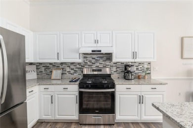 Step inside this beautifully updated 4-bedroom, 2.5-bathroom on Haile Plantation Golf and Country Club in Florida - for sale on GolfHomes.com, golf home, golf lot