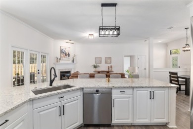 Step inside this beautifully updated 4-bedroom, 2.5-bathroom on Haile Plantation Golf and Country Club in Florida - for sale on GolfHomes.com, golf home, golf lot