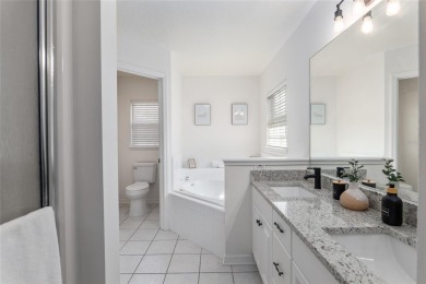 Step inside this beautifully updated 4-bedroom, 2.5-bathroom on Haile Plantation Golf and Country Club in Florida - for sale on GolfHomes.com, golf home, golf lot