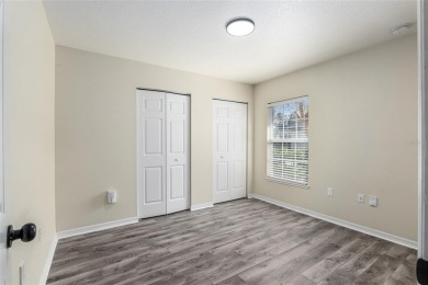 Step inside this beautifully updated 4-bedroom, 2.5-bathroom on Haile Plantation Golf and Country Club in Florida - for sale on GolfHomes.com, golf home, golf lot