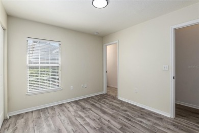 Step inside this beautifully updated 4-bedroom, 2.5-bathroom on Haile Plantation Golf and Country Club in Florida - for sale on GolfHomes.com, golf home, golf lot