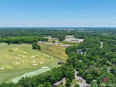 Looking for the convenience of condo living with the square on University of Georgia Golf Course in Georgia - for sale on GolfHomes.com, golf home, golf lot