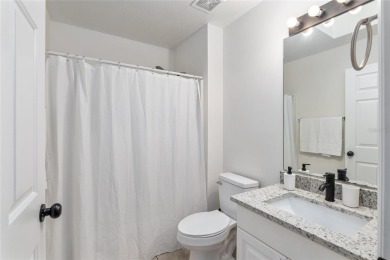 Step inside this beautifully updated 4-bedroom, 2.5-bathroom on Haile Plantation Golf and Country Club in Florida - for sale on GolfHomes.com, golf home, golf lot
