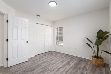 Step inside this beautifully updated 4-bedroom, 2.5-bathroom on Haile Plantation Golf and Country Club in Florida - for sale on GolfHomes.com, golf home, golf lot