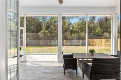 Step inside this beautifully updated 4-bedroom, 2.5-bathroom on Haile Plantation Golf and Country Club in Florida - for sale on GolfHomes.com, golf home, golf lot