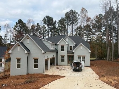 This  beautiful custom home built by gold winning Triple A Homes on Chapel Ridge Golf Club in North Carolina - for sale on GolfHomes.com, golf home, golf lot