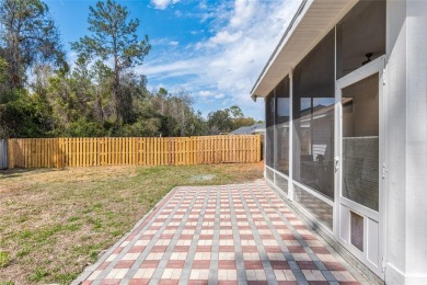 Step inside this beautifully updated 4-bedroom, 2.5-bathroom on Haile Plantation Golf and Country Club in Florida - for sale on GolfHomes.com, golf home, golf lot