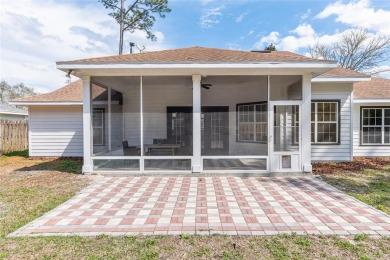 Step inside this beautifully updated 4-bedroom, 2.5-bathroom on Haile Plantation Golf and Country Club in Florida - for sale on GolfHomes.com, golf home, golf lot